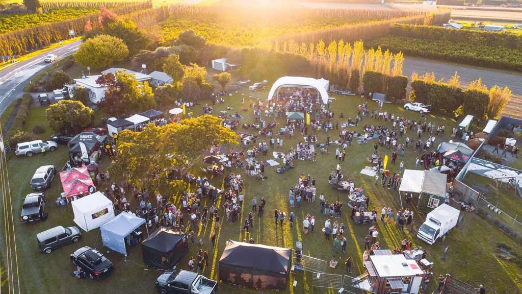 Aerial view of the Gisborne Beer Festival at sunset