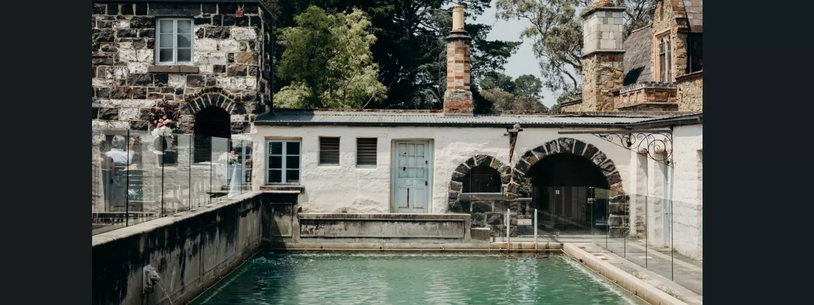 The stone courtyard and reflection pool at Montsalvat historic artists colony