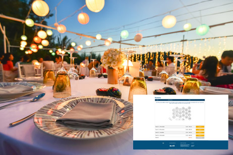 table set for fancy event with lanterns above