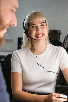 A woman wearing a headset