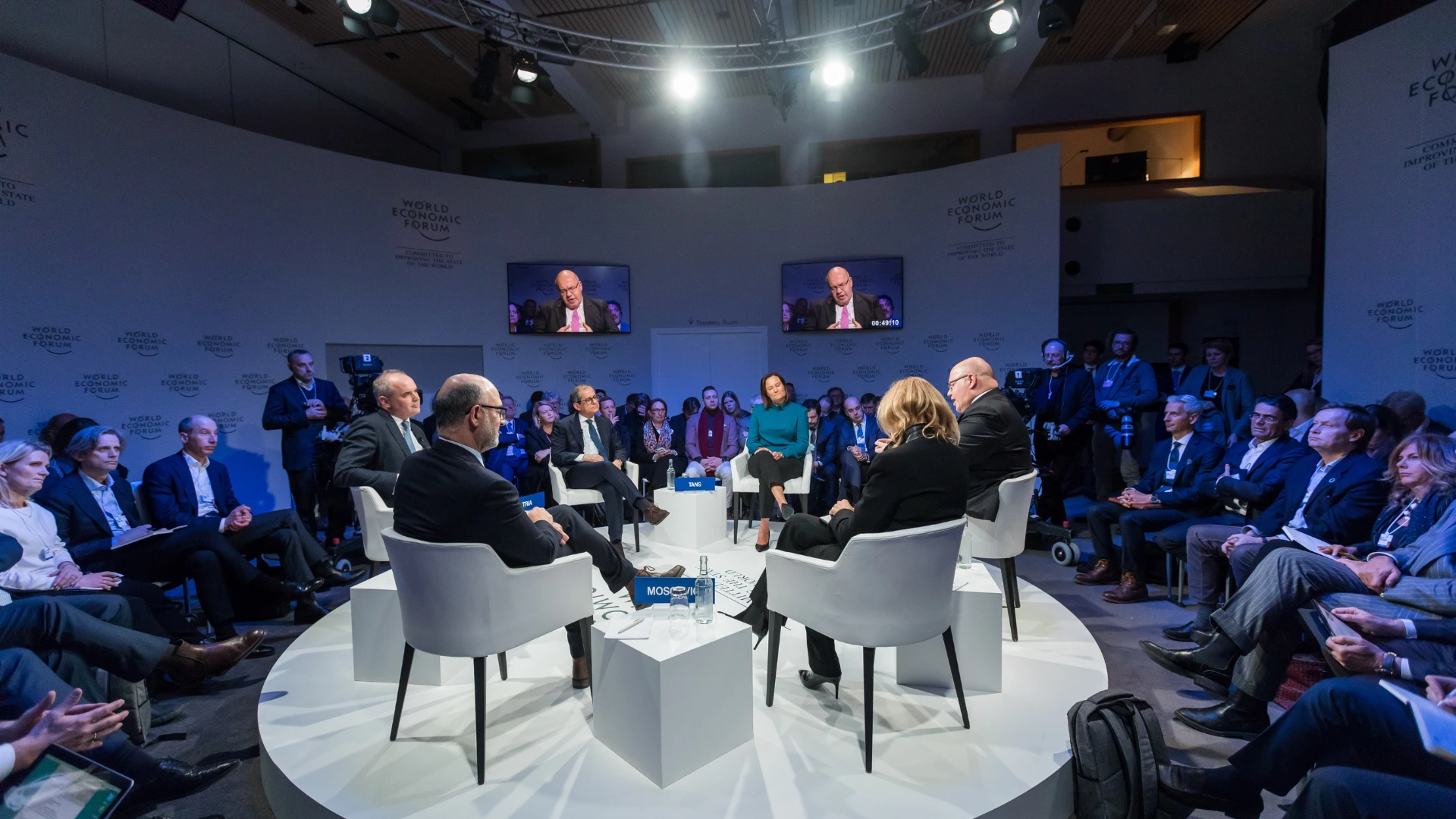 Medical conference panel discussion with delegates