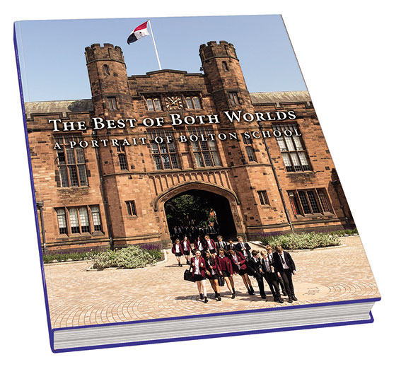 Cover of The Best of Both Worlds: A Portrait of Bolton School. Behind the title, which sits just above the centre of the cover, is a photograph of boys and girls in uniform walking through the centre arch below Bolton School's iconic turrets and clocktower, which are made of sandstone